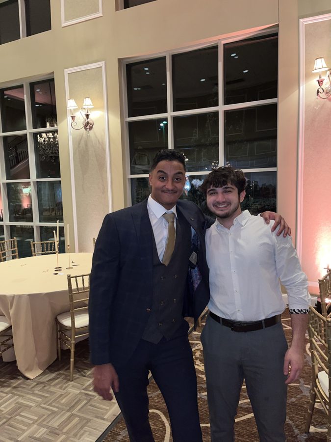 Abdul with a friend at a formal event
